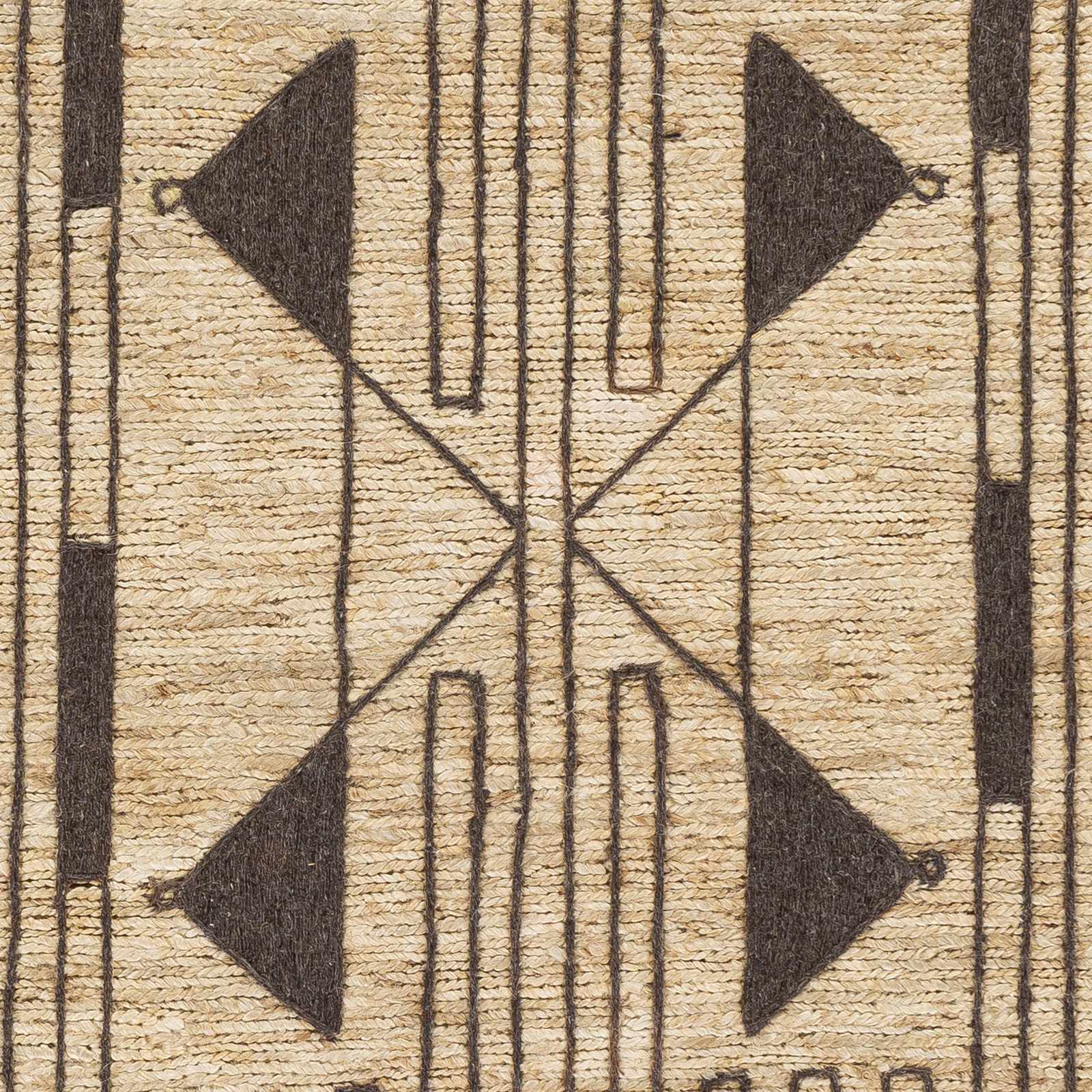 Hand-knotted jute and wool rug with ornate texture