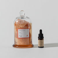 Himalayan salt stones in a lidded glass diffuser vessel
