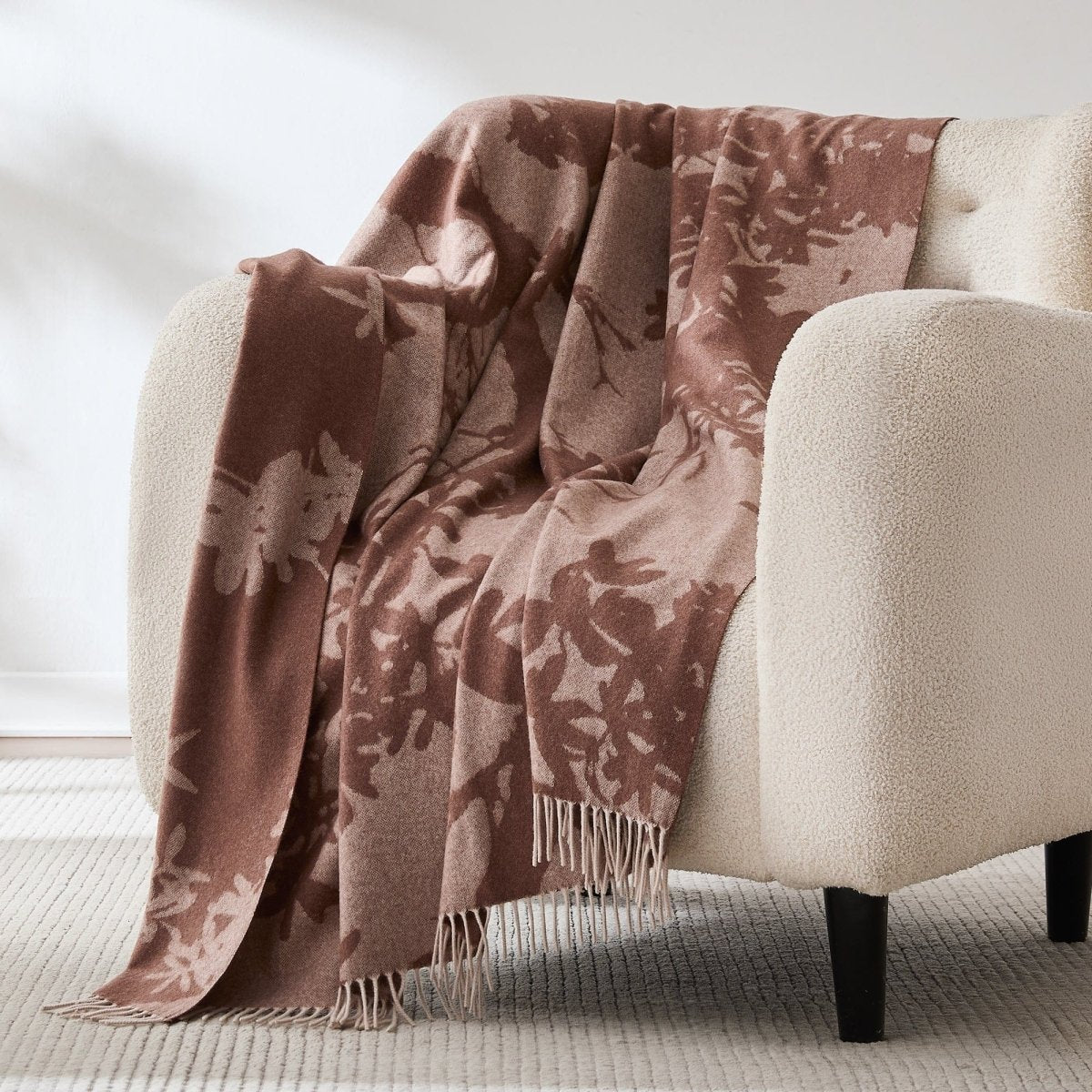 Wool and cashmere throw with a forest canopy inspired pattern