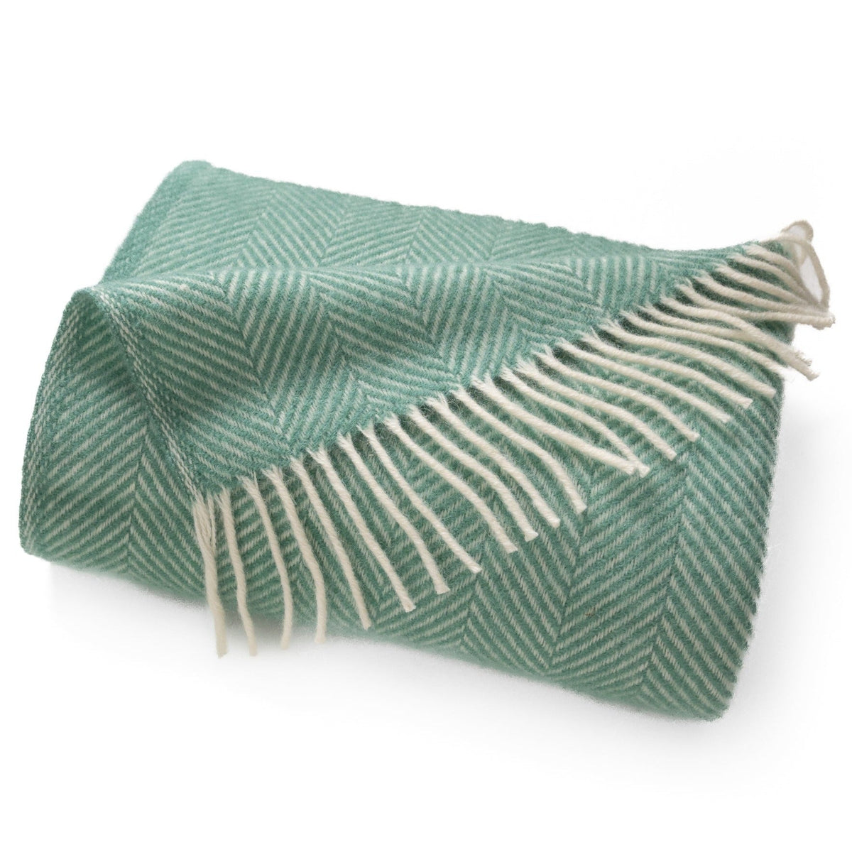 Mint herringbone wool throw with fringe