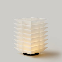 Cordless lamp with stacked louvered layers in a pagoda form