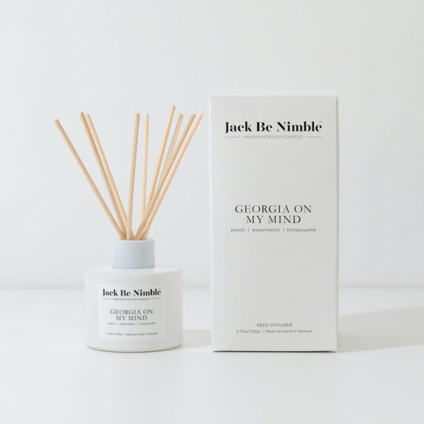 Georgia On My Mind reed diffuser in a matte white glass vessel
