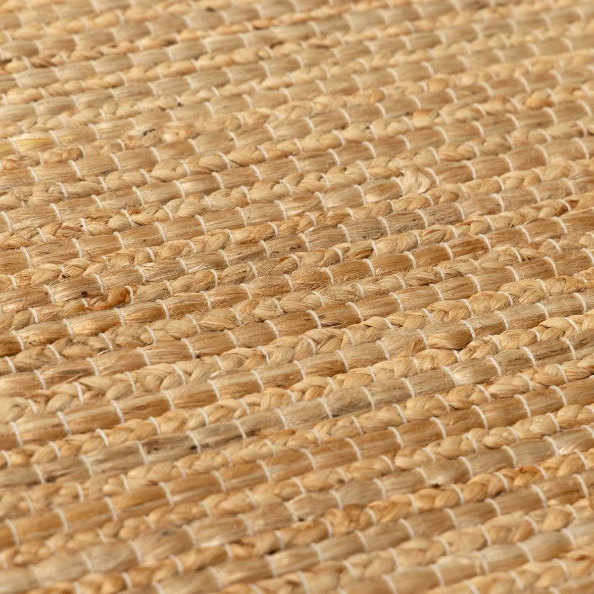 Hand-loomed jute and cotton rug with botanical texture