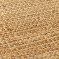 Hand-loomed jute and cotton rug with botanical texture