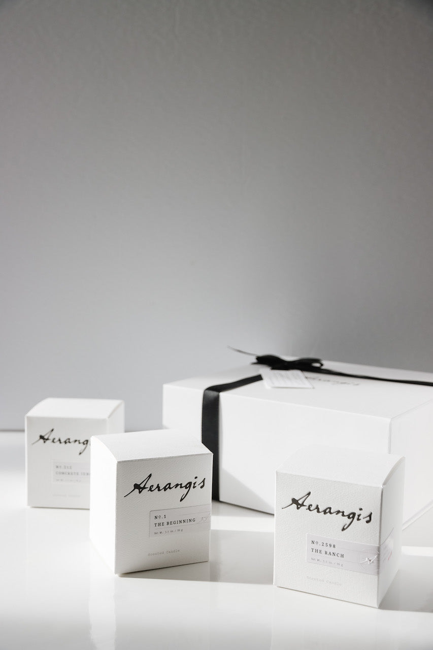 Gift set of three mini candles with a wick trimmer and scent cards