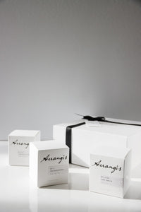 Gift set of three mini candles with a wick trimmer and scent cards