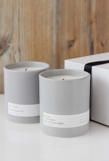 Two-candle gift set with a matchbook in gift packaging