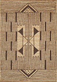 Hand-knotted jute rug with a charcoal and peach tribal pattern