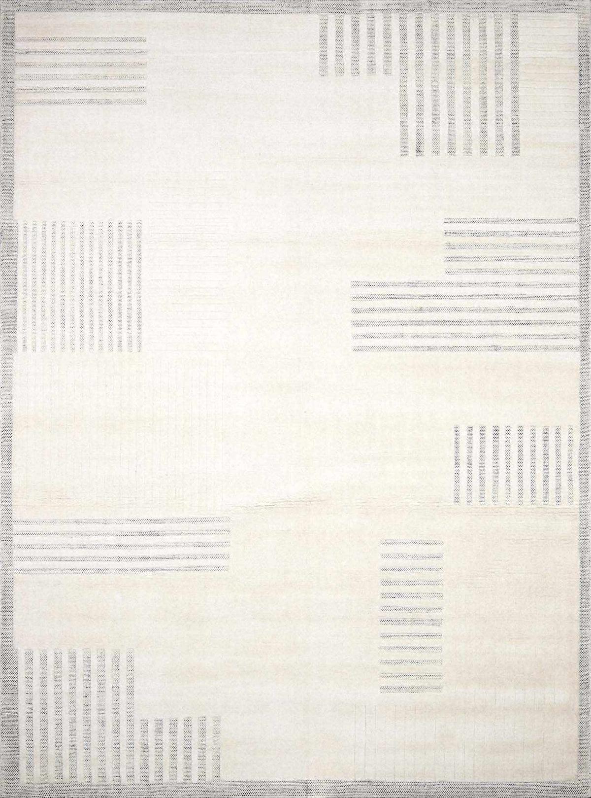 Hand-loomed wool rug in light silver, off-white and silver gray