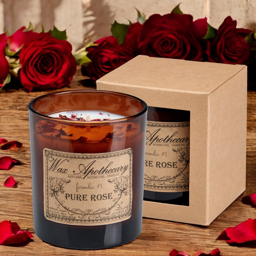 Rose botanical candle in an amber glass tumbler