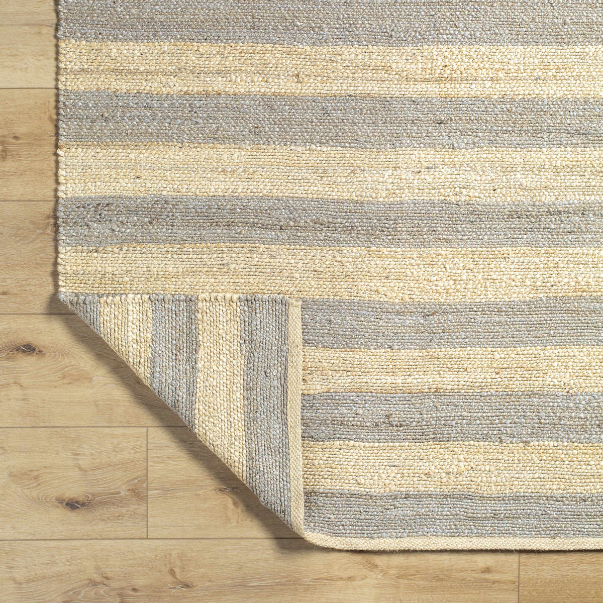 Ilkay Striped Jute Area Rug