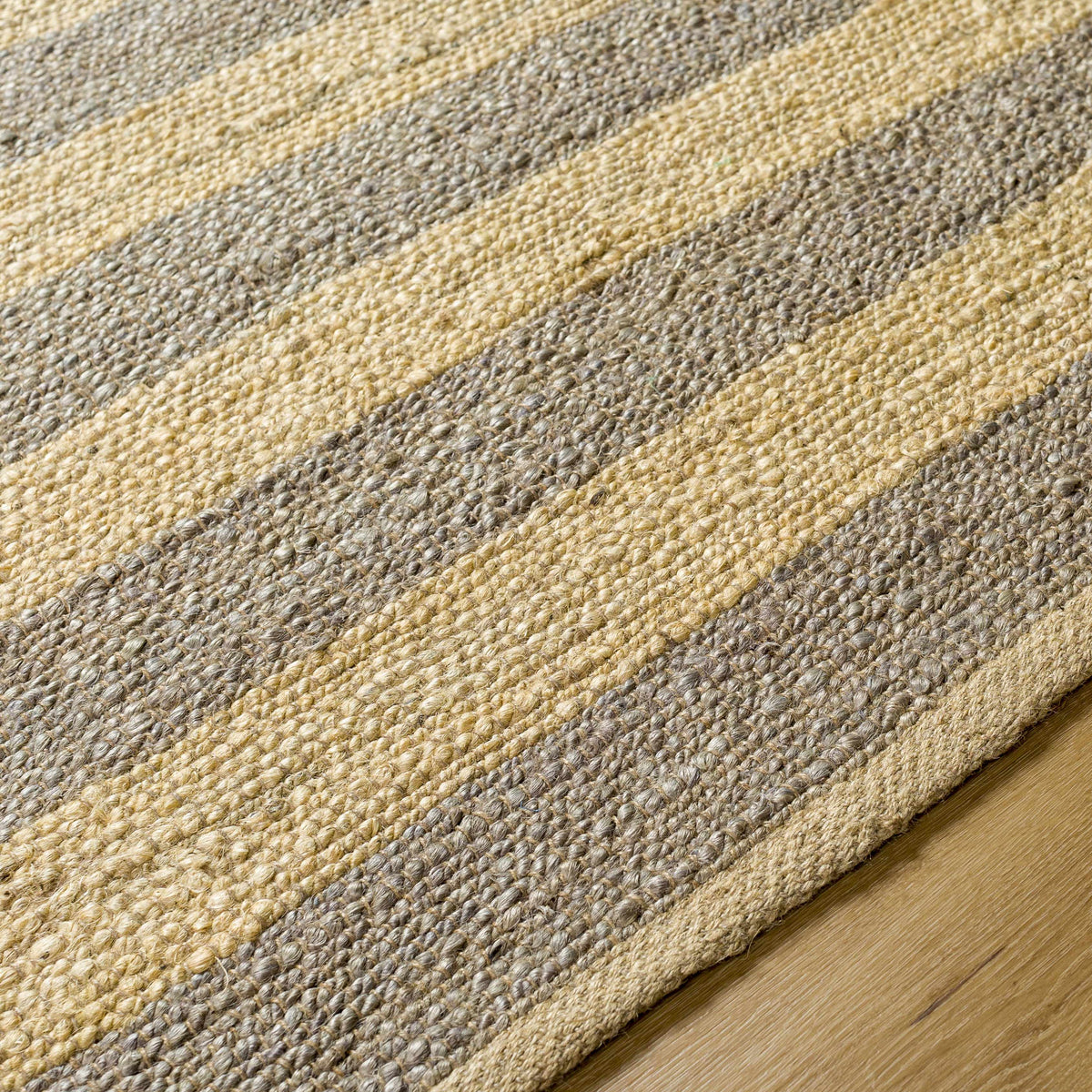 Ilkay Striped Jute Area Rug