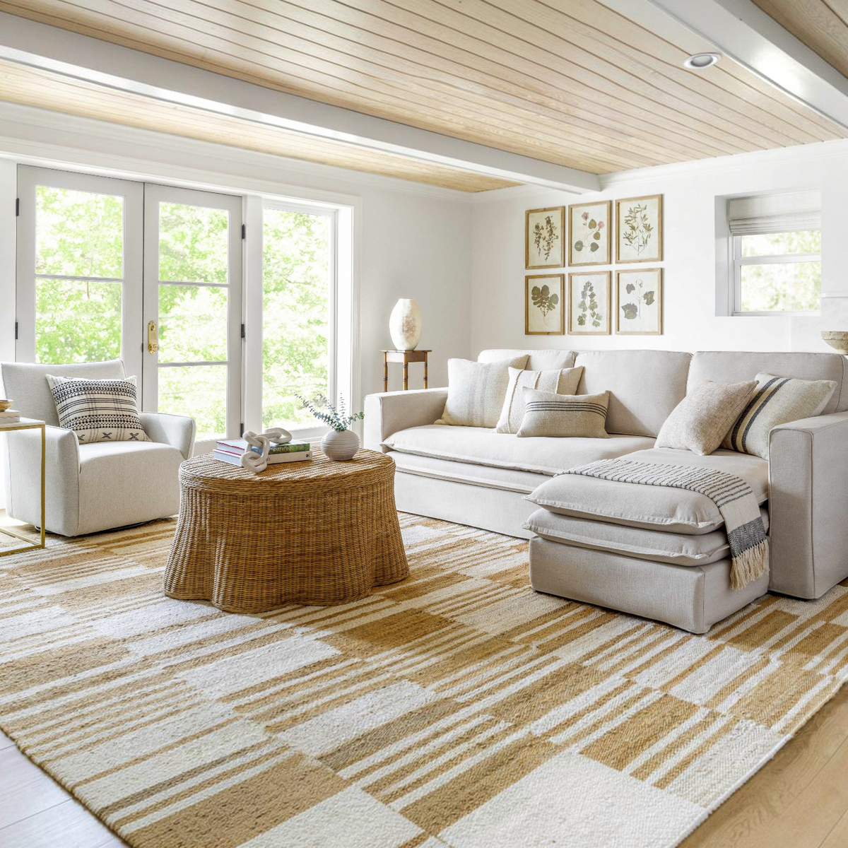 Natural jute flatweave rug in ivory and tan stripe pattern.