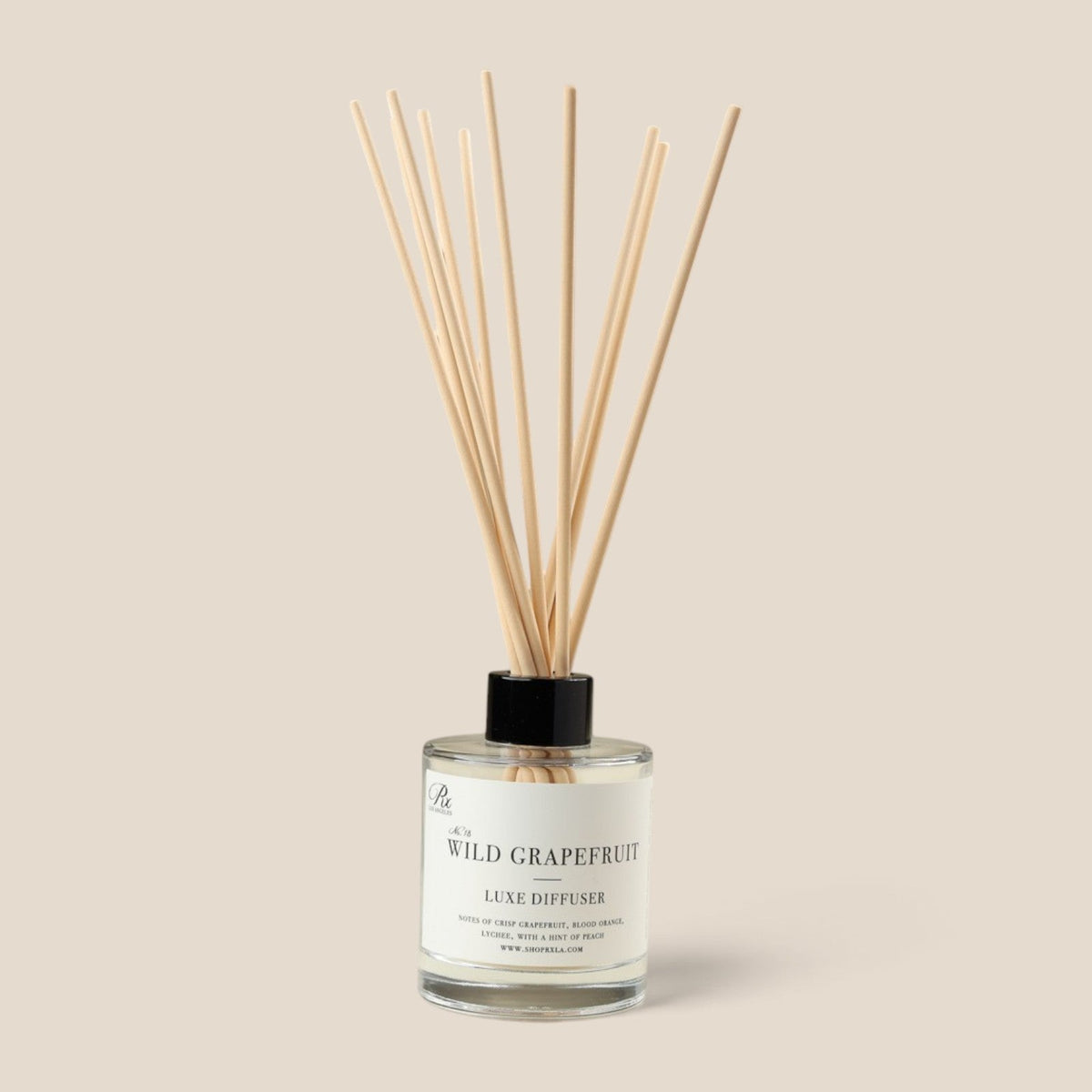 Wild Grapefruit reed diffuser with fiber reeds