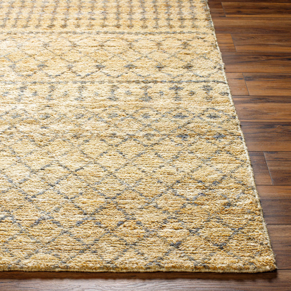 Hand-knotted natural jute area rug with painterly tones