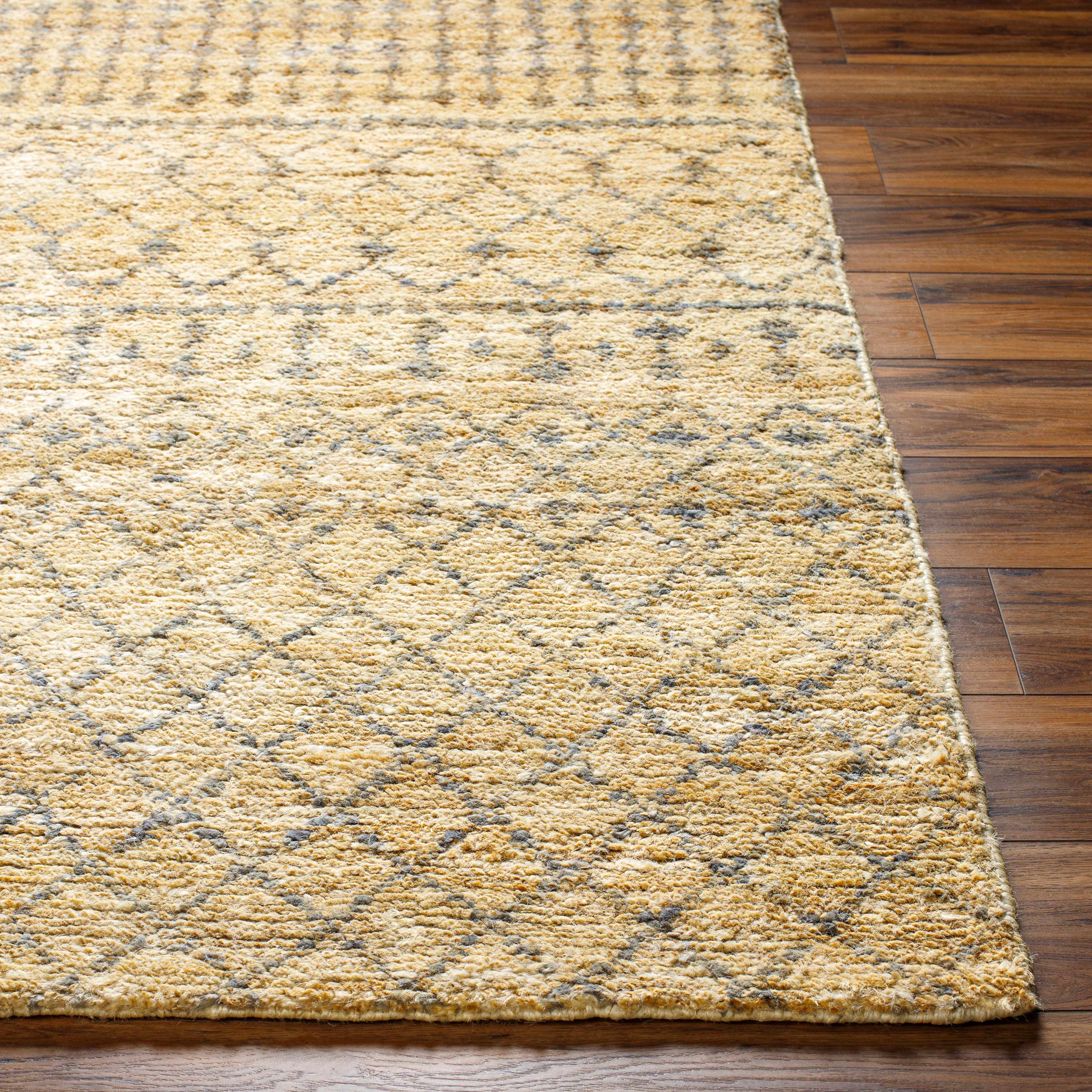 Hand-knotted natural jute area rug with painterly tones